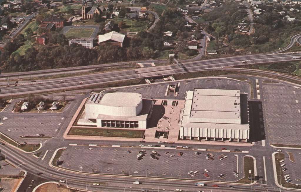 Roanoke Civic Center with Homes in Parking Lot 